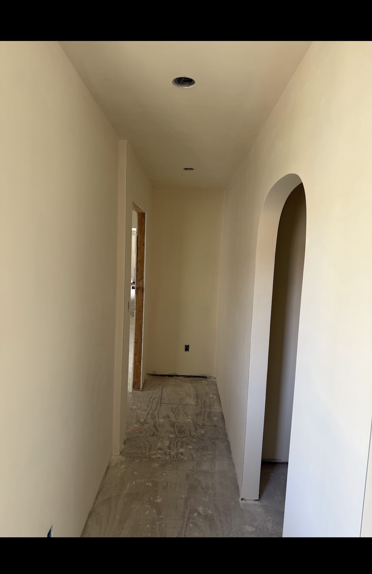 Finished hallway with arch detail